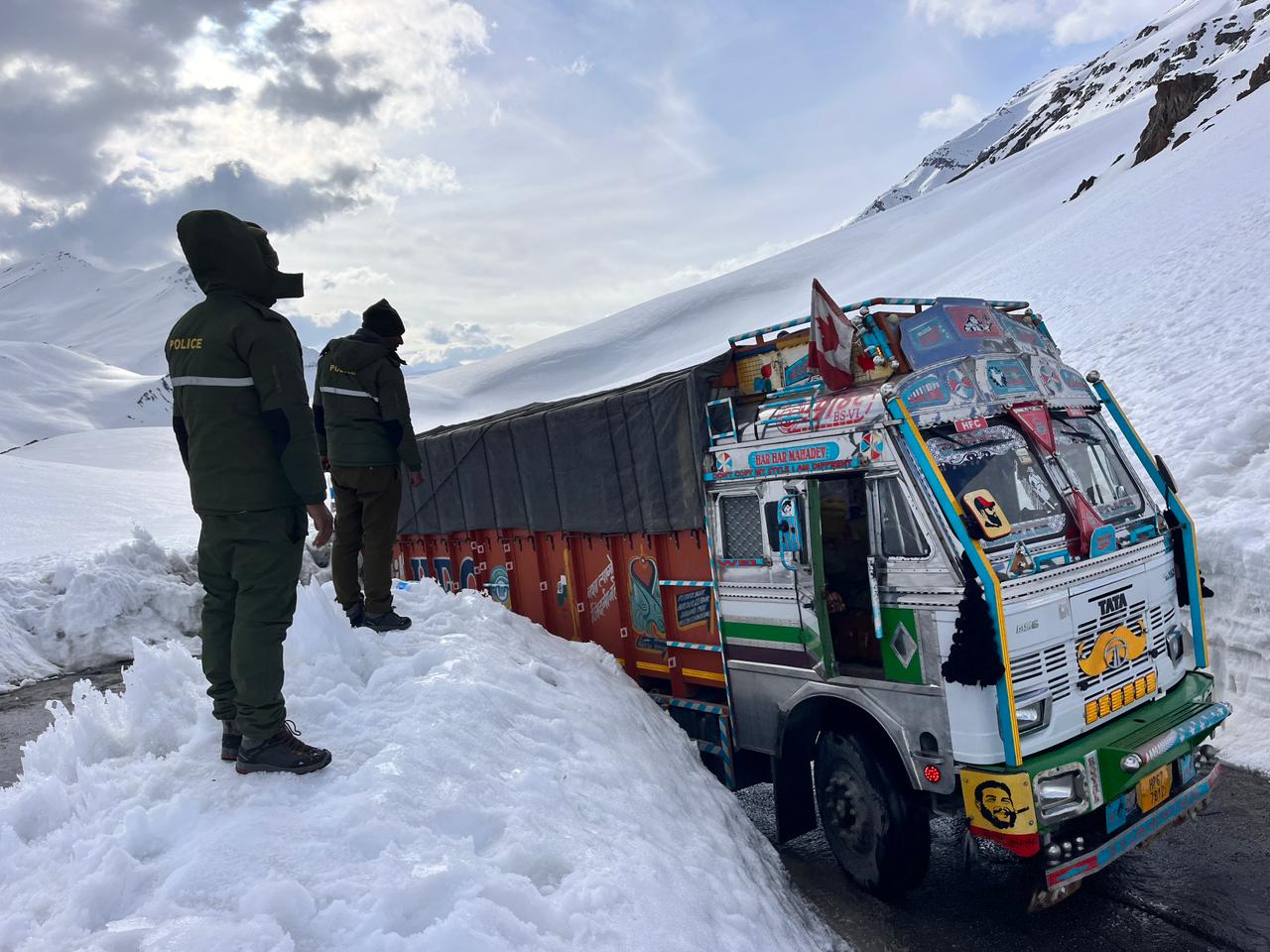 A truck treading uphill through the slippery road towards Baralacha pass from Darcha side in Lahaul valley of Himachal on Manali-Leh highway